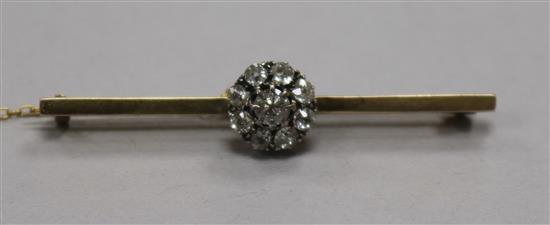 A yellow metal and diamond cluster bar brooch, 51mm.